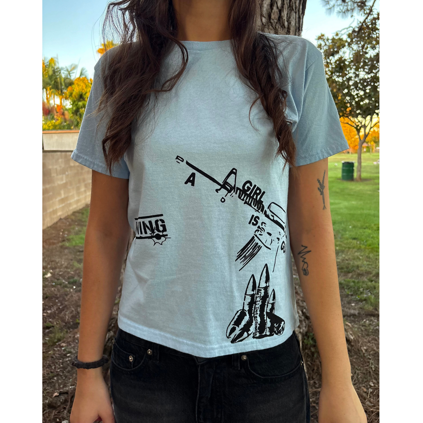 "A girl is a gun" Baby Tee